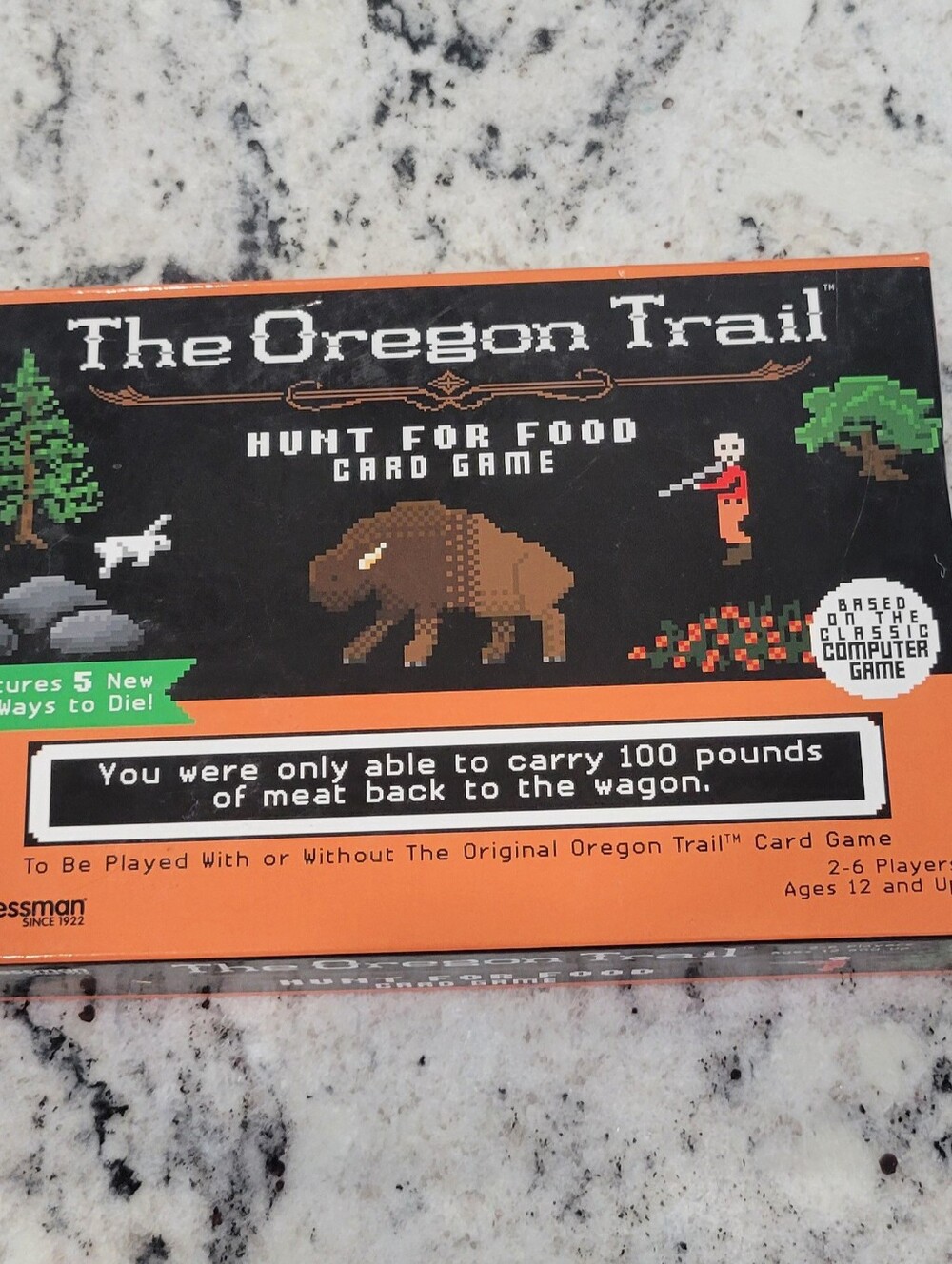 The Oregon Trail Hunt For Food Card Game - Black & Orange Box